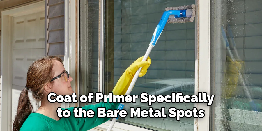 Coat of Primer Specifically to the Bare Metal Spots